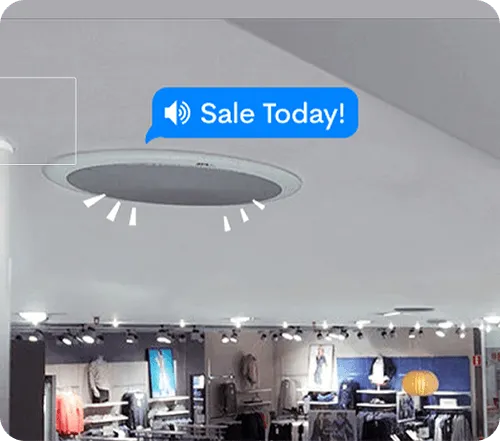 Ceiling-mounted speaker with a blue notification bubble saying 'Sale Today!' in a retail clothing store.