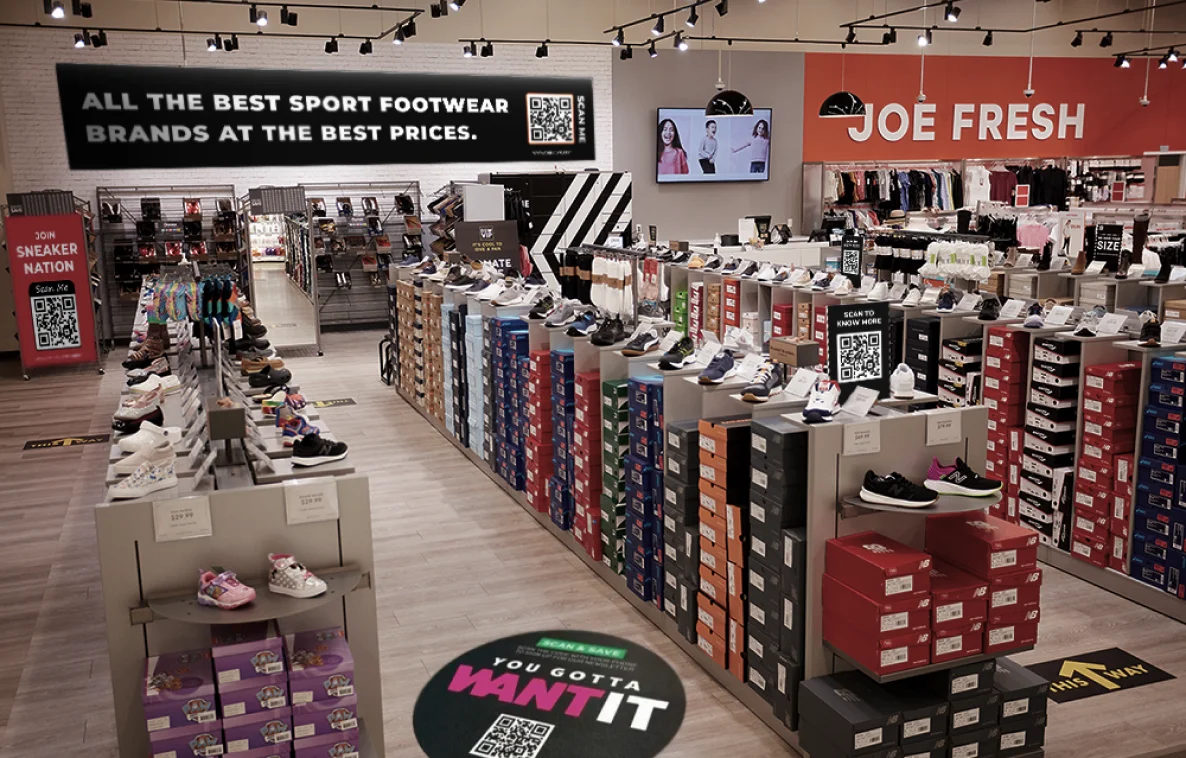 A store filled with lots of shoes and boxes.