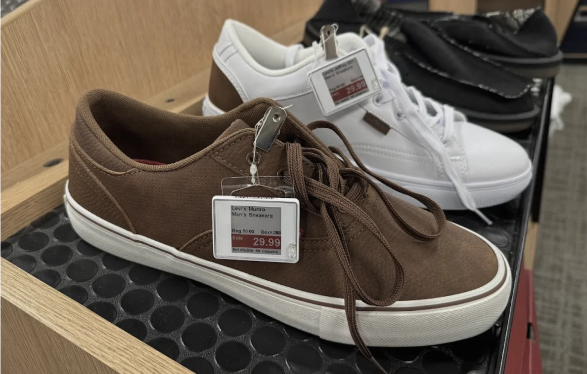 A couple of shoes that are on a shelf.